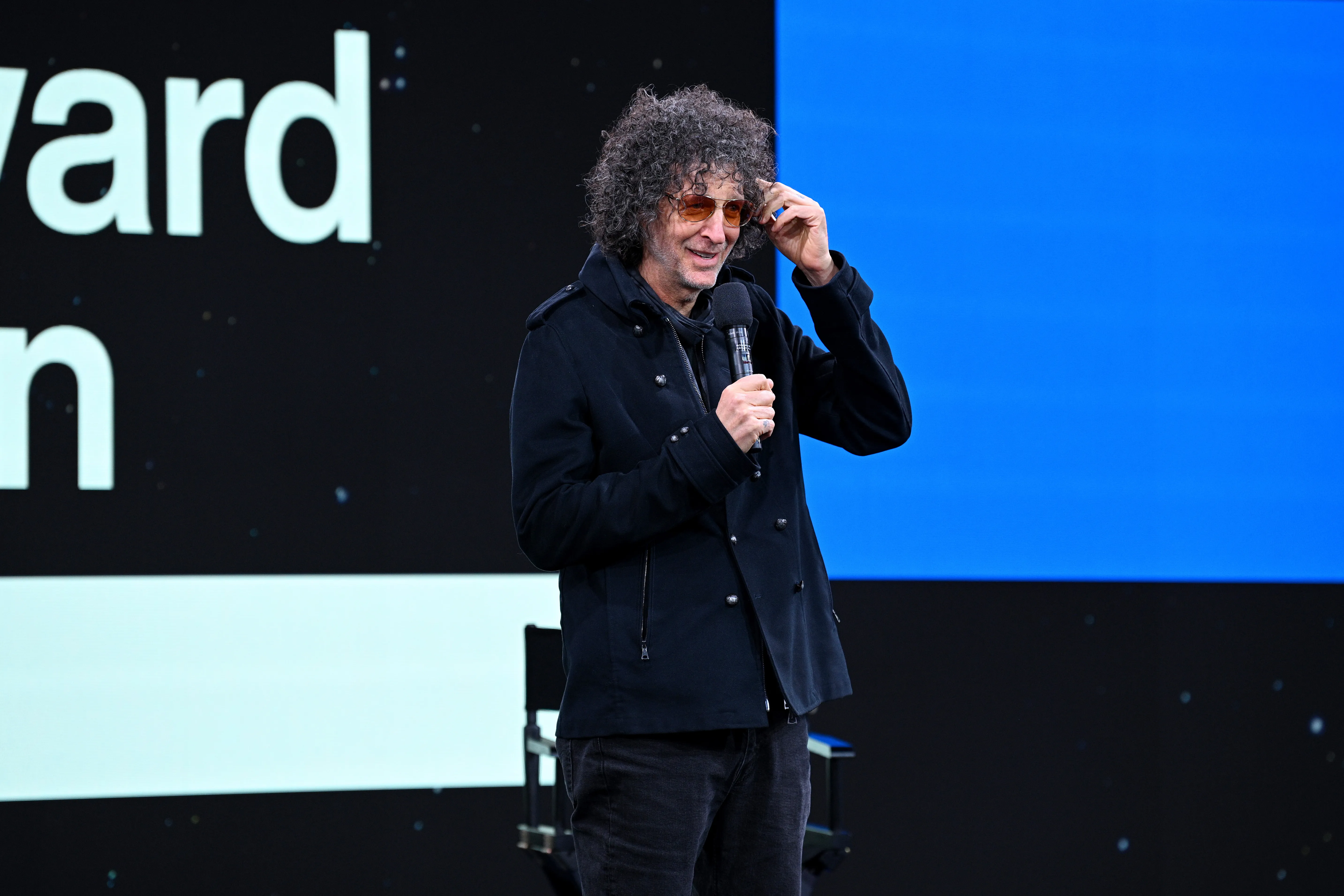 Howard Stern speaking onstage at the SiriusXM Next Generation event.