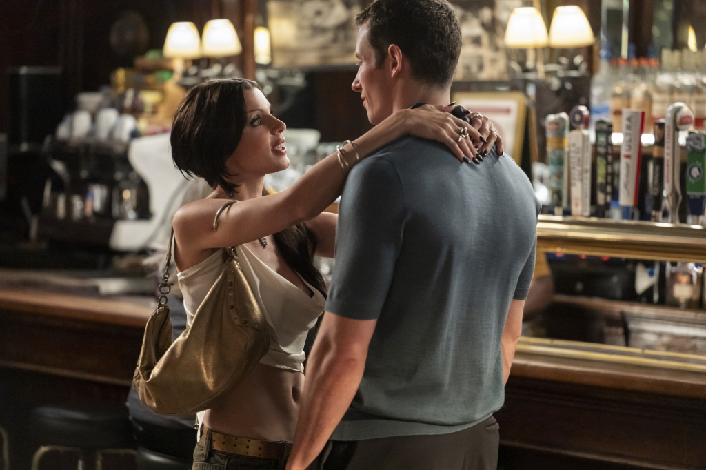 Julia Fox and Callum Turner in a scene from 