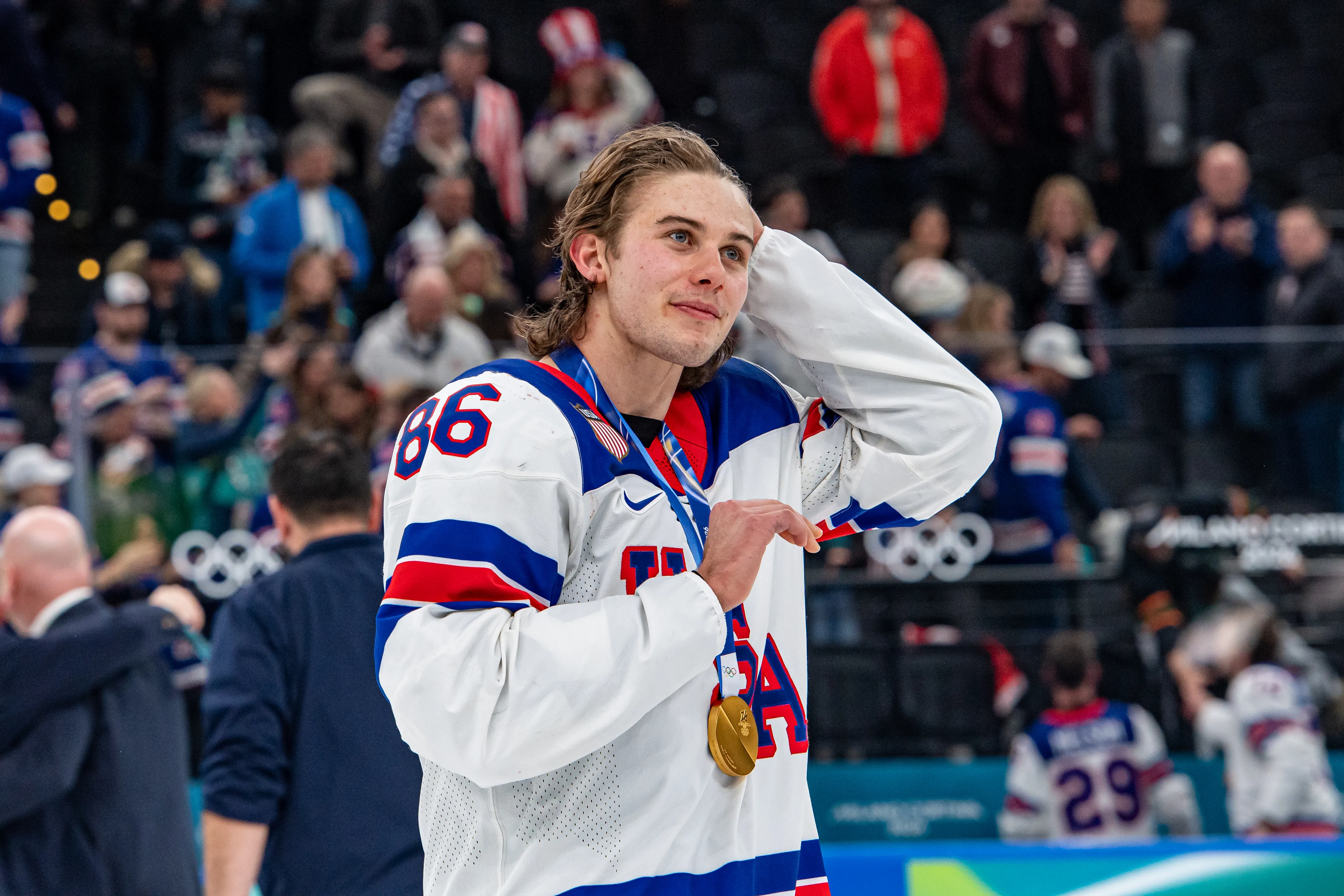 Jack Hughes celebrates the win with medal during the Men's Gold Medal match between Canada and United States on day sixteen of the Milano Cortina 2026 Winter Olympic games at Milano Santagiulia Ice Hockey Arena on Feb. 22, 2026 in Milan, Italy.