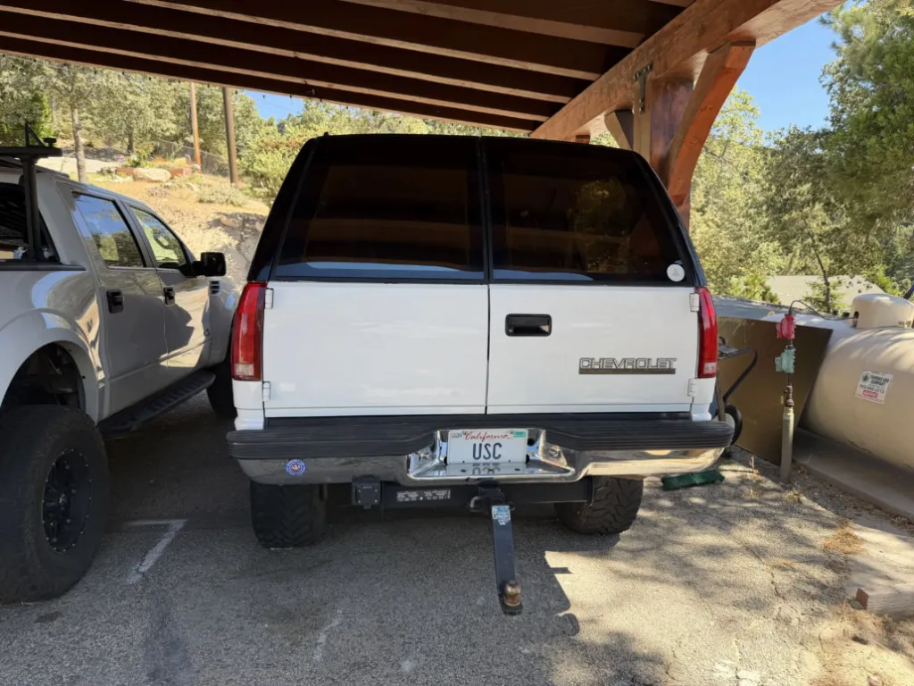 The back of Jeff Grotewold's white Chevrolet vehicle with a USC license plate.