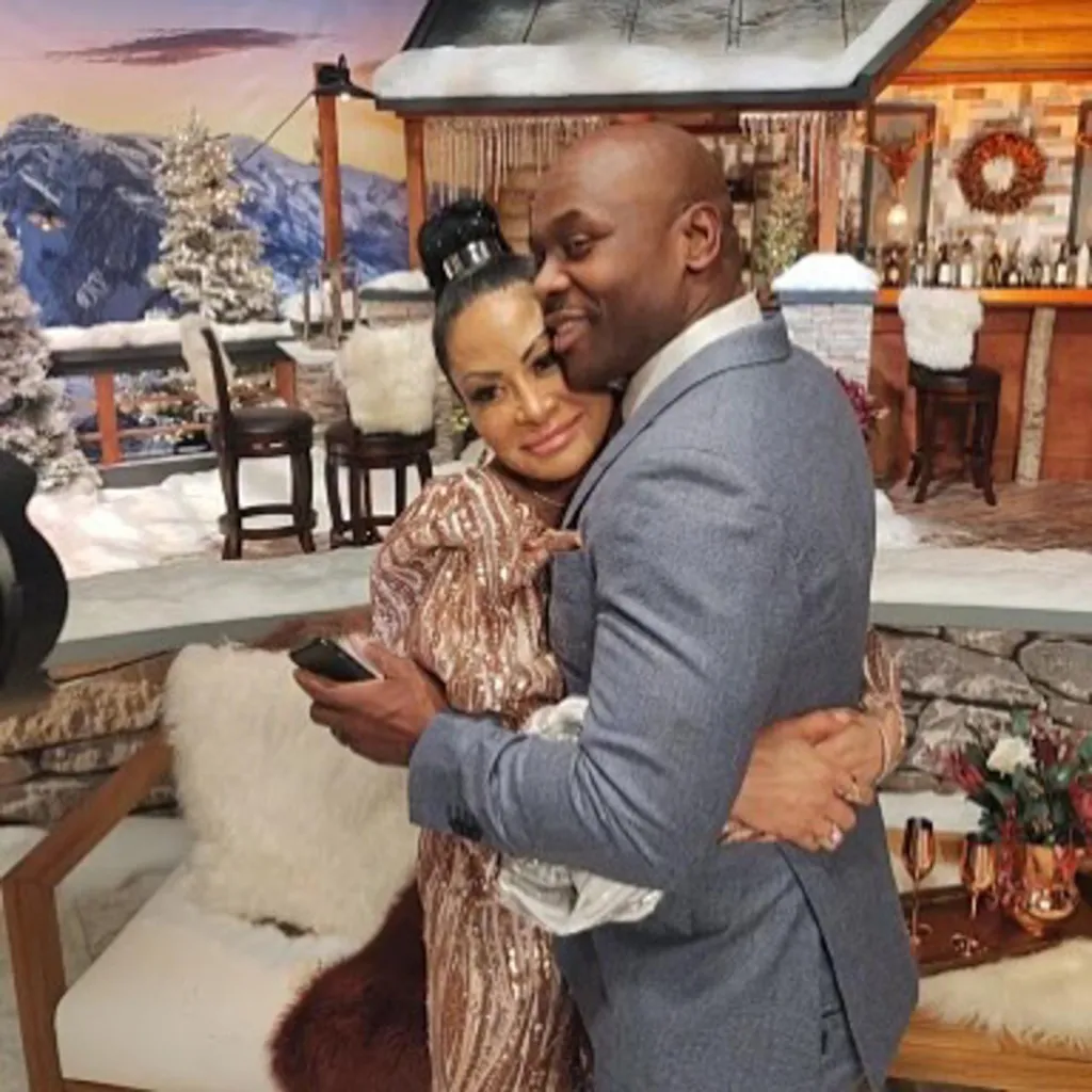 Jen Shah and husband Sharrieff Shah embrace.