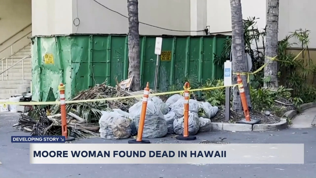 Crime scene with a green dumpster, palm trees, and bags of debris cordoned off with yellow tape.