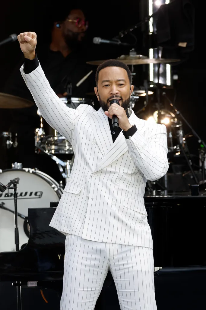 John Legend performing during the dedication ceremony for the opening of the Barack Obama Presidential Center.