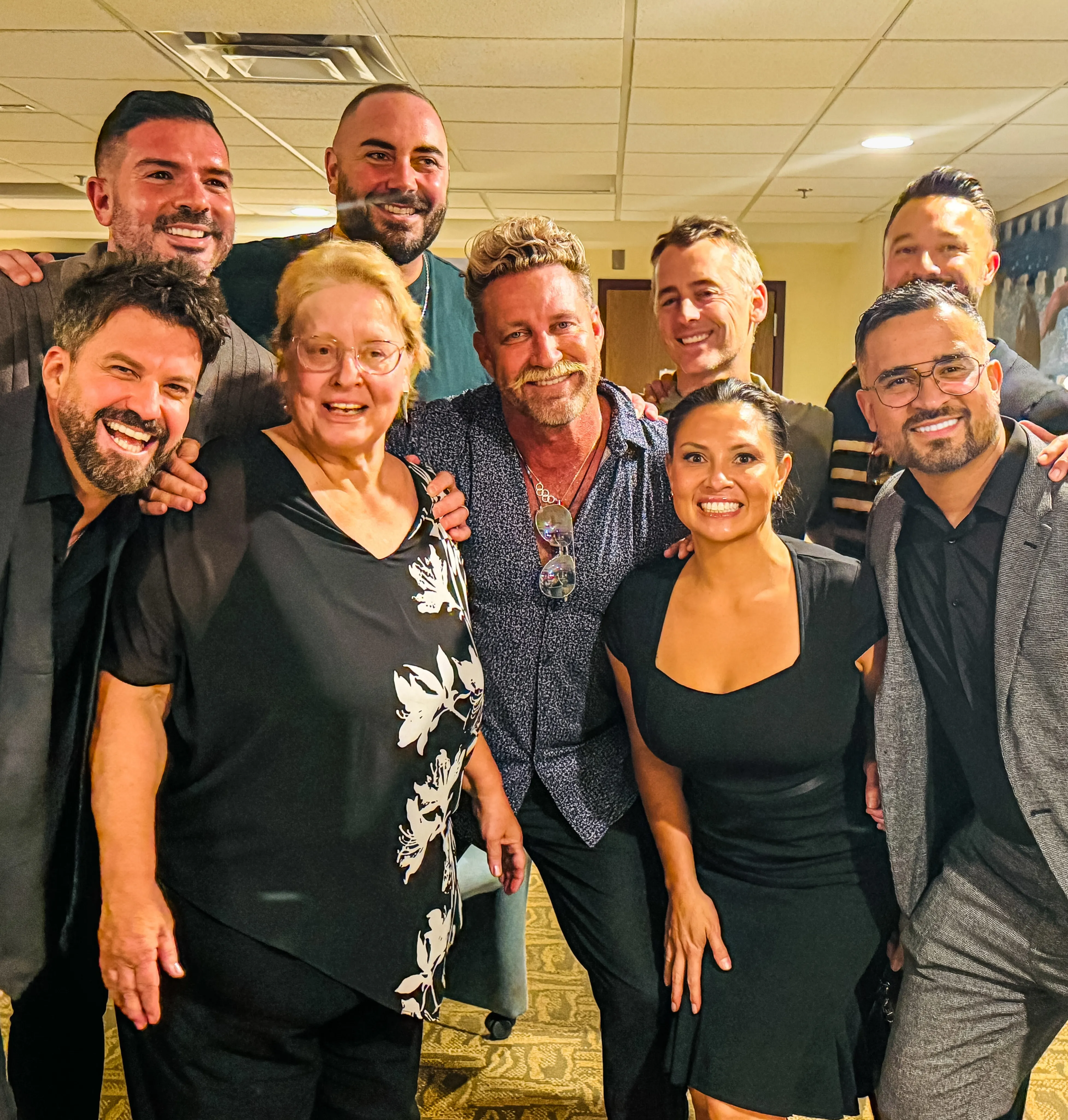 Johnny Bananas (center) with friends and family at Tyler Duckworth's funeral.