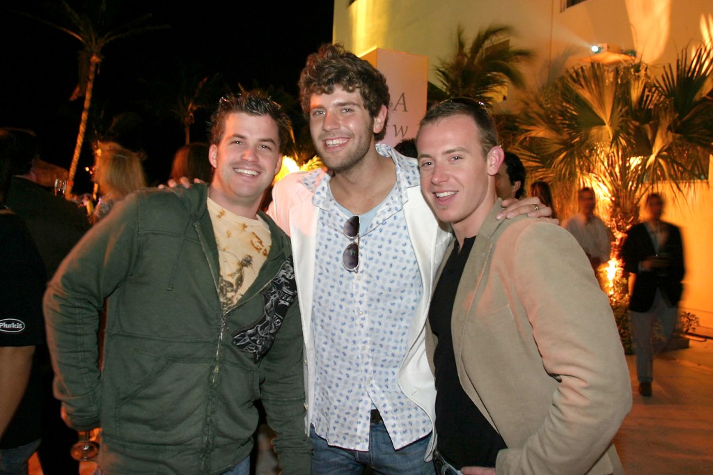 Johnny Bananas, Zach Mann and Tyler Duckworth pose together at an event.