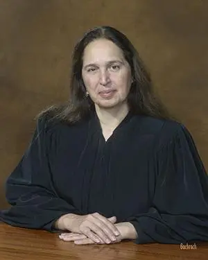 US District Judge Indira Talwani blocked a USPS rule backed by Donald Trump that would have restricted mail-in voting ahead of the election.