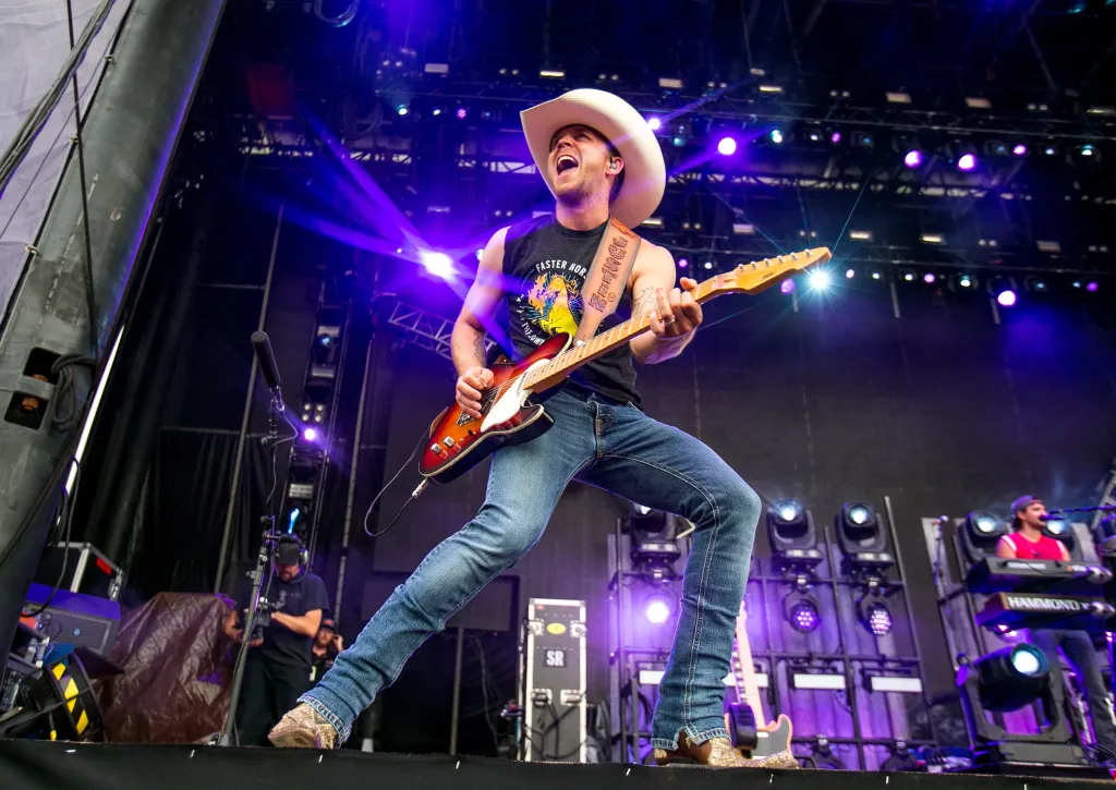 Justin Moore performs country western music at the Faster Horses Festival.