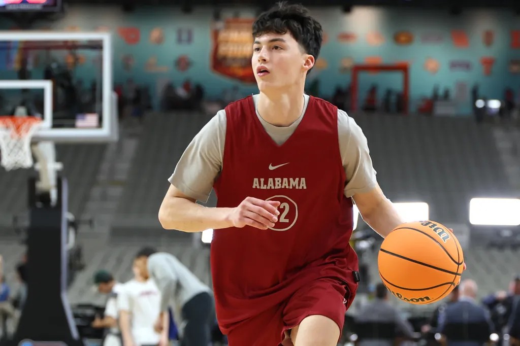 Alabama's Kai Spears dribbles during practice at State Farm Stadium in Glendale, Arizona, on April 5, 2024.