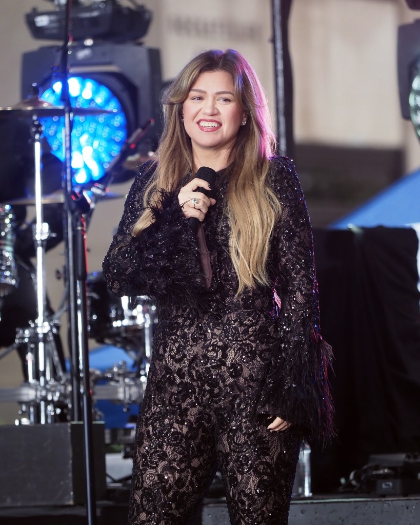 Kelly Clarkson performing on stage.