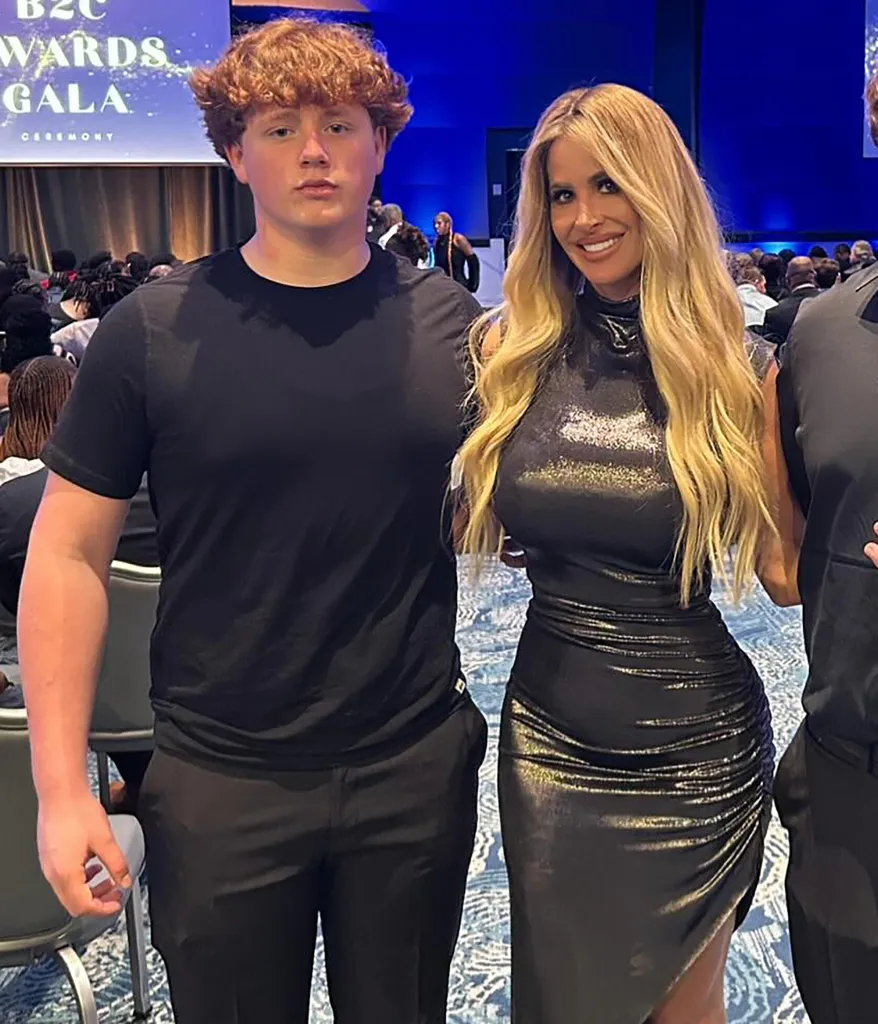 Kim Zolciak and her son KJ Biermann at an event.