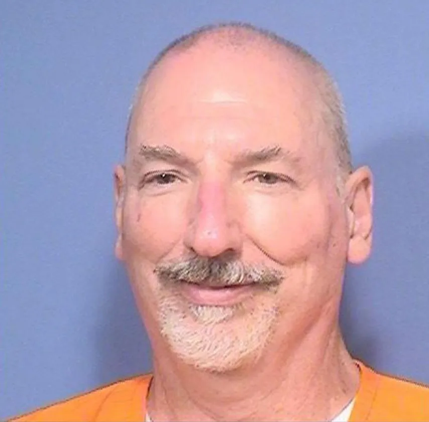 Mugshot of David Allen Funston, a bald man with a mustache and goatee, wearing an orange prison uniform.