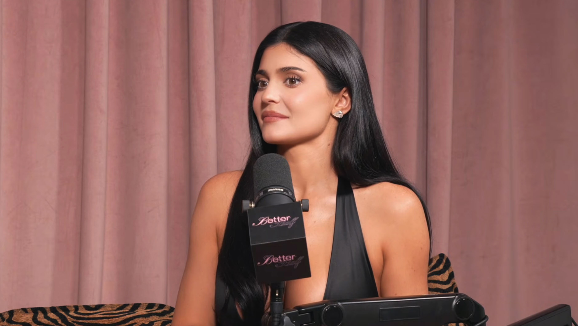 Kylie Jenner speaking into a microphone.