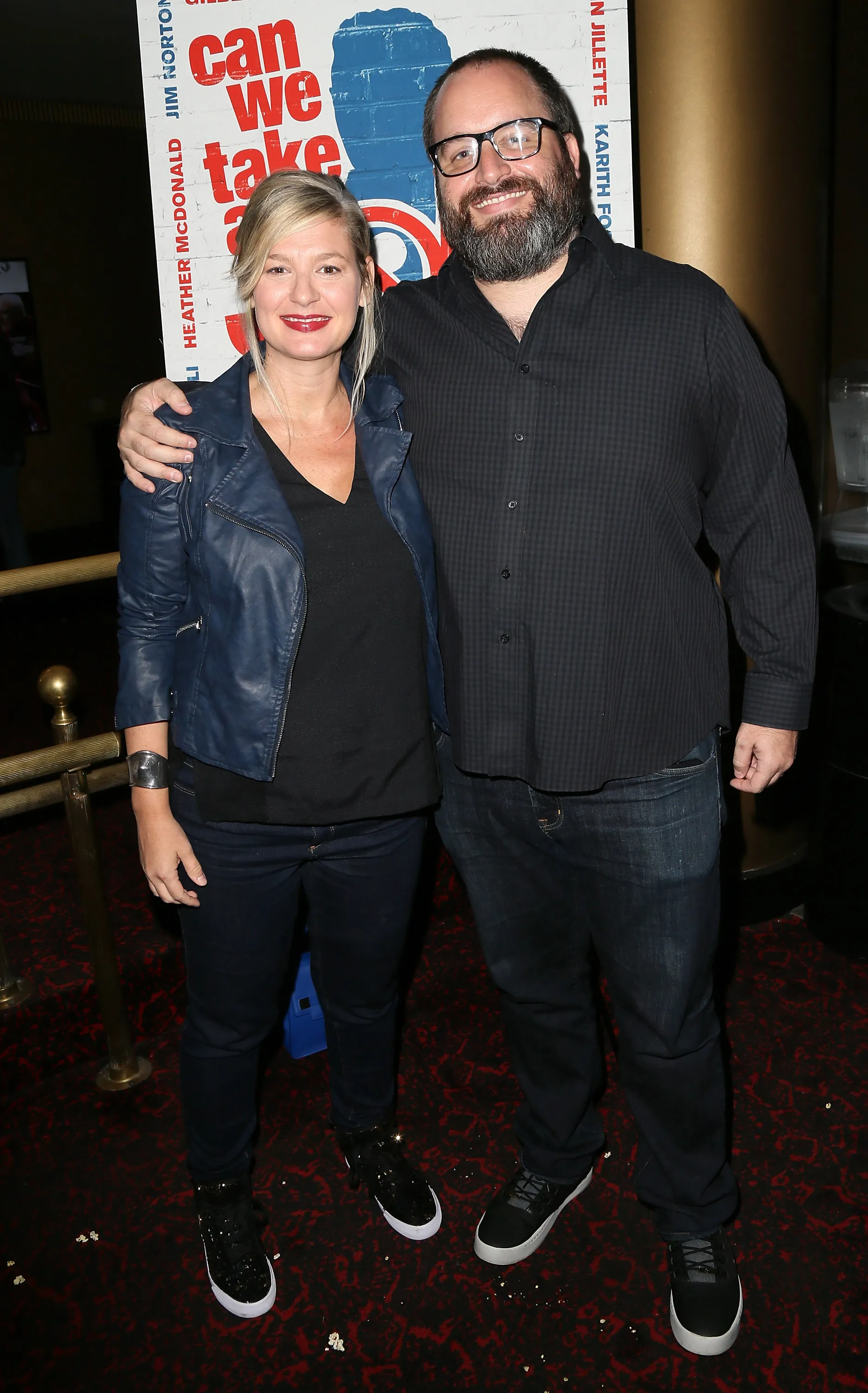 Comedian Christina Pazsitzky and comedian Tom Segura at a film premiere.