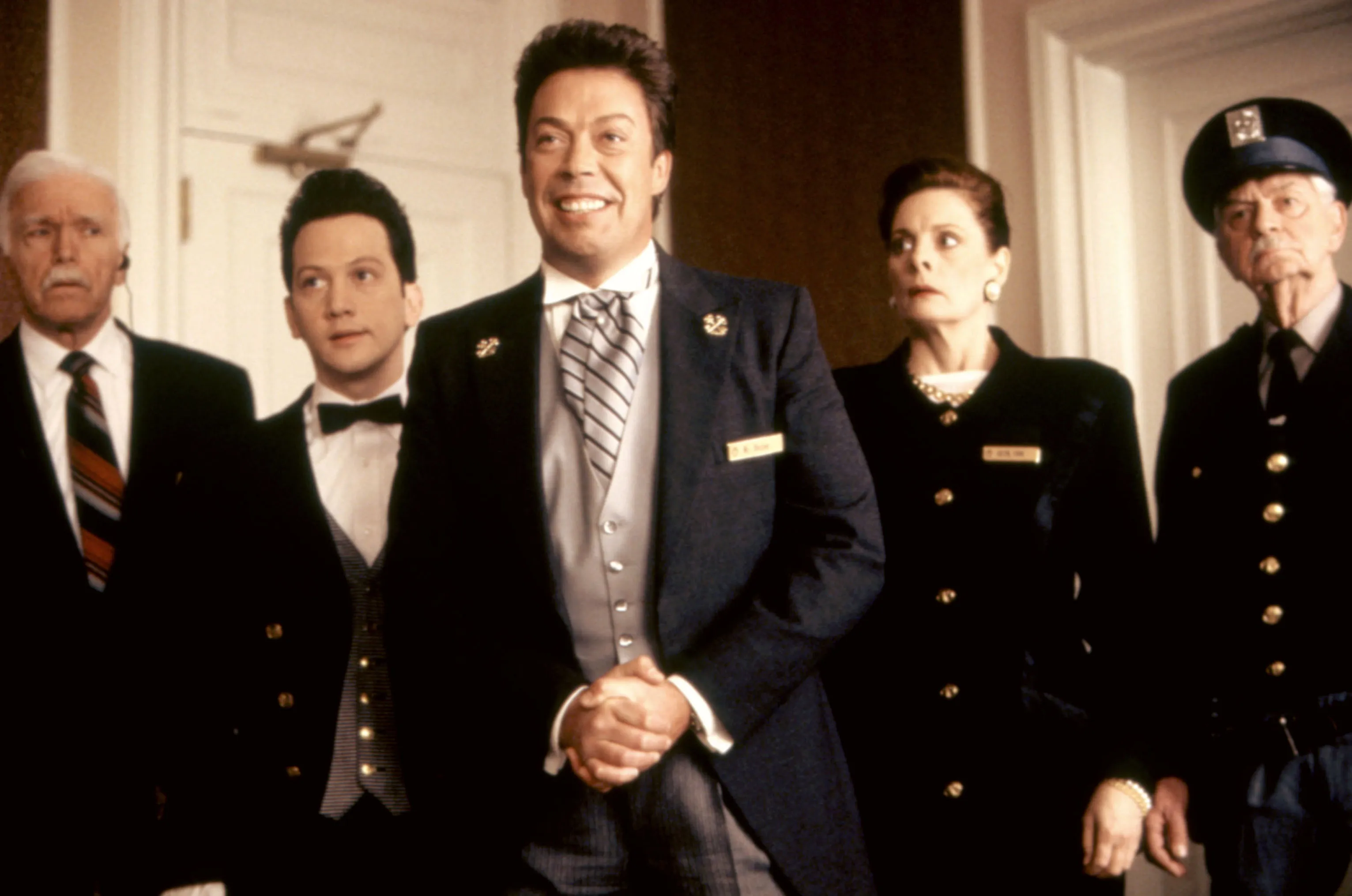 Left to right: James Cole, Rob Schneider, Tim Curry, Dana Ivey, and Fred Krause in