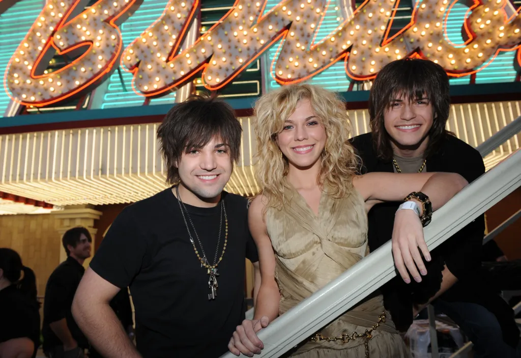 Musicians Neil Perry, Kimberly Perry and Reid Perry of The Band Perry pose at the 45th Annual Academy of Country Music Awards.