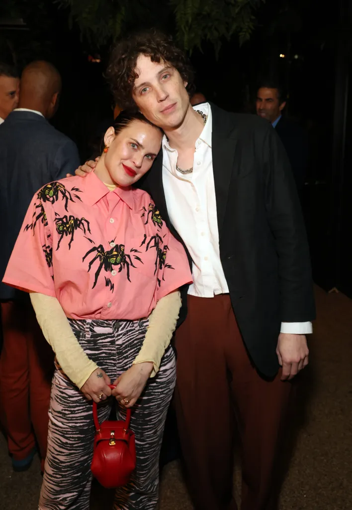 Tallulah Willis and Justin Acee posing together at an event.