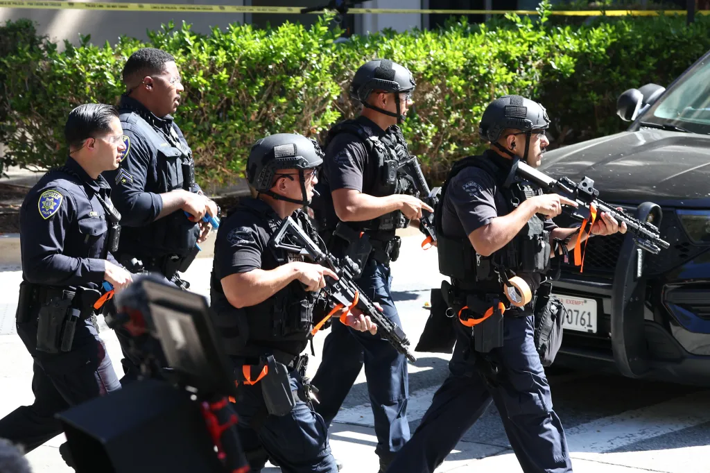 LAPD and UCLA police officers participate in a SWAT drill for upcoming Olympics security.