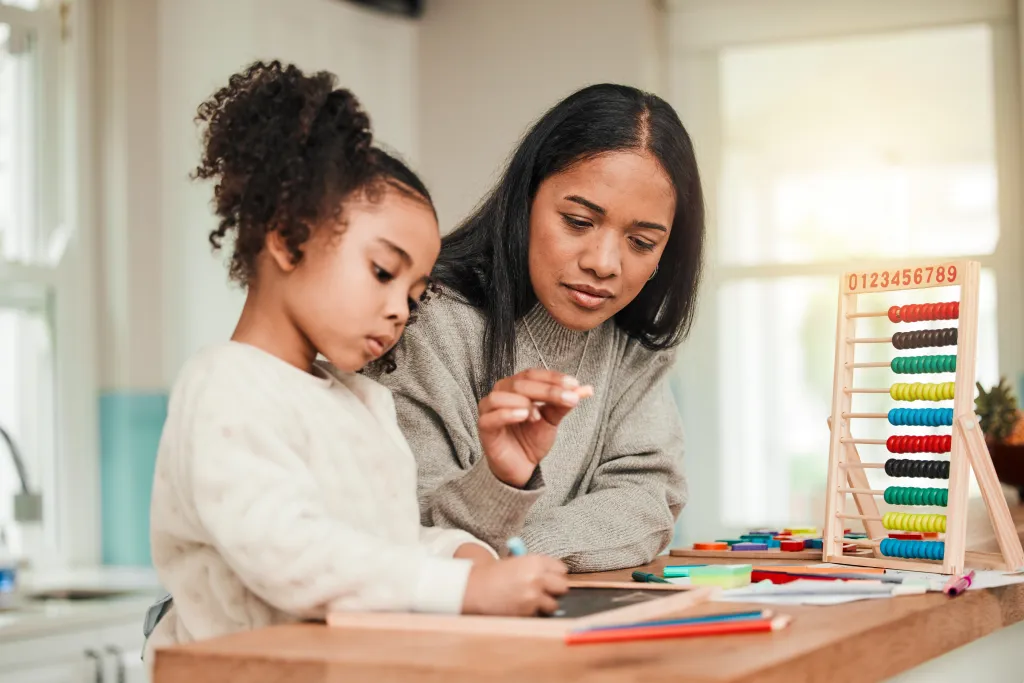 Overworked mom helping daughter. 