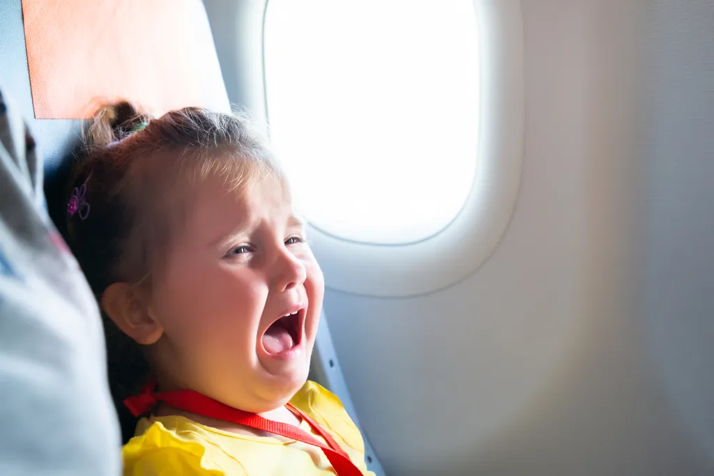 Crying child on plane.