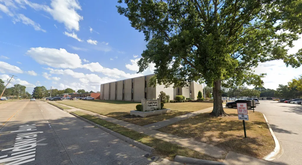 Exterior view of the Caddo Parish Public Schools building and street entrance.