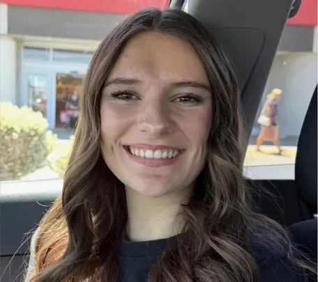 Portrait of Maddalyn Dailey, smiling.