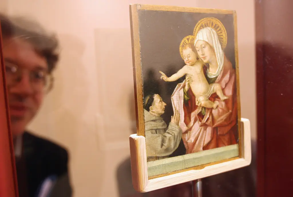 The thieves took a fourth artwork from a secure display case: a small two-sided painting depicting the Virgin with Child and a Franciscan monk on one side and the Christ on the other.