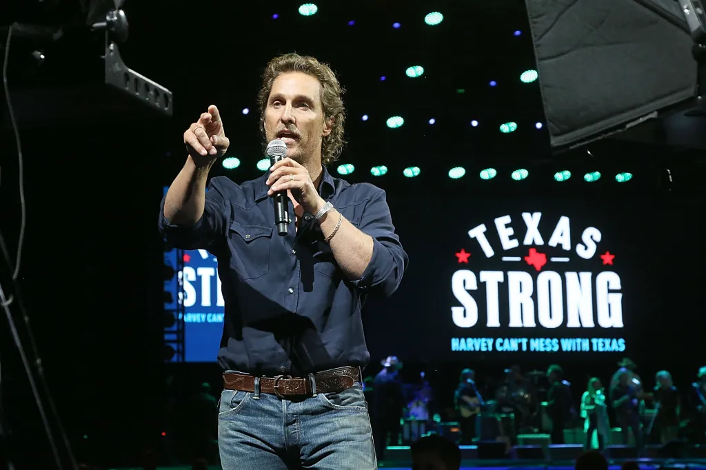 Matthew McConaughey speaks into a microphone at the 