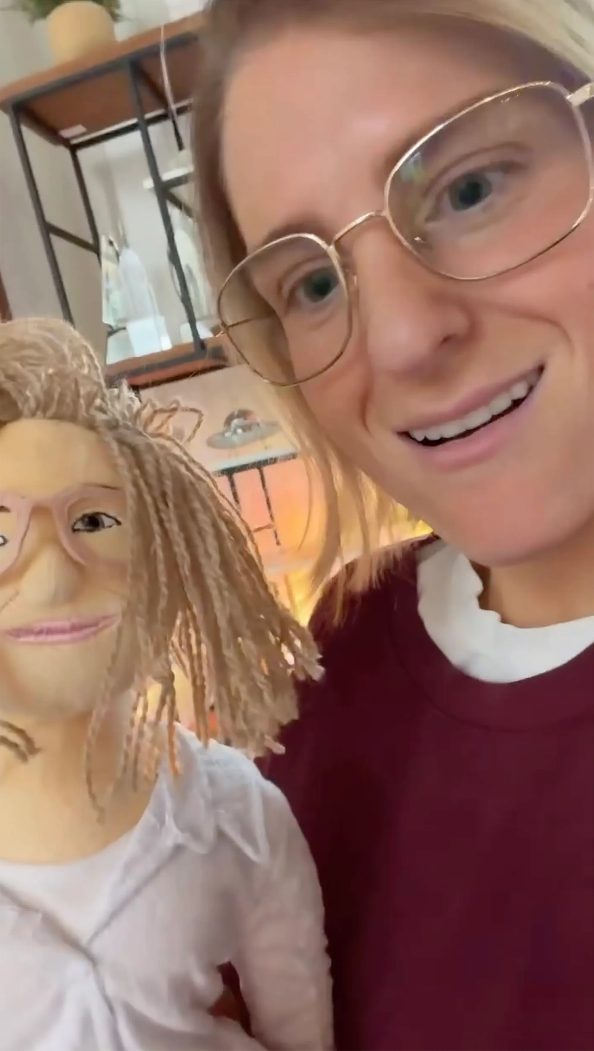 Meghan Trainor posing with a look-alike doll.