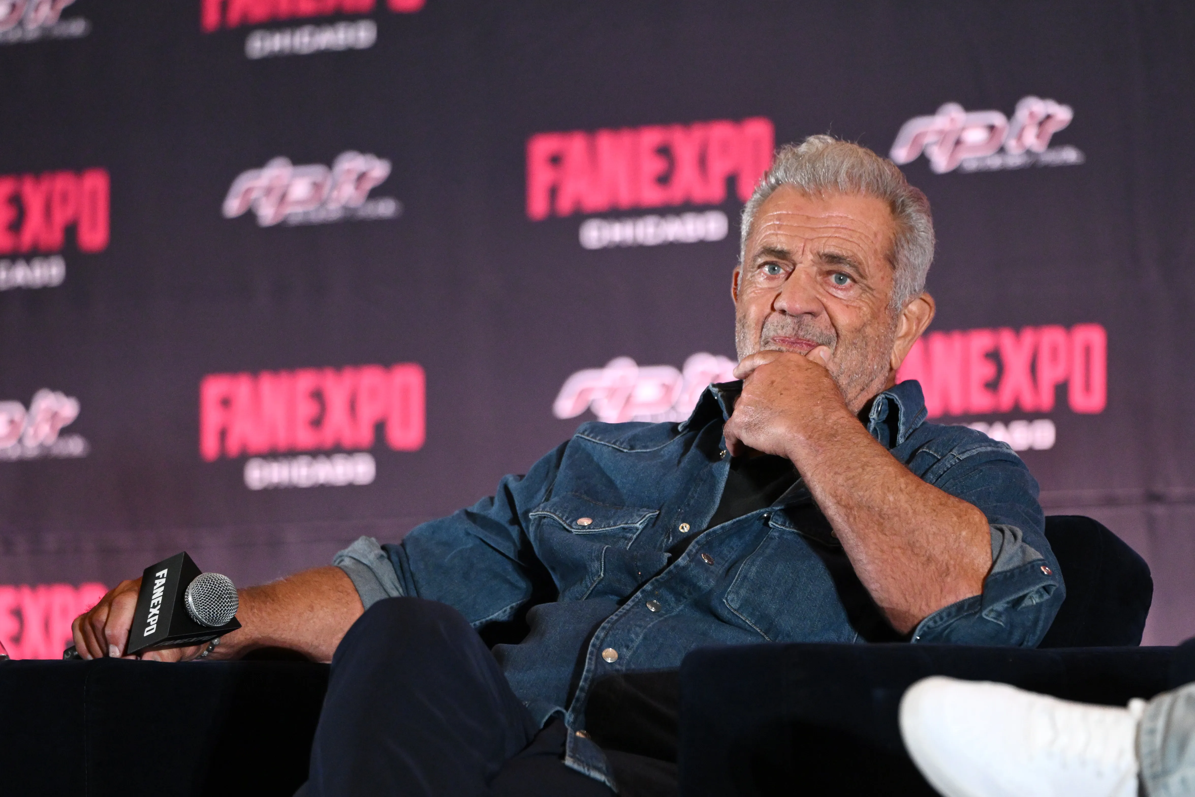 Mel Gibson speaking onstage during FanExpo Chicago 2026.