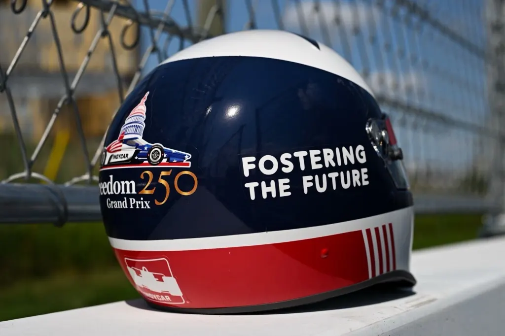Blue, white, and red IndyCar helmet with 