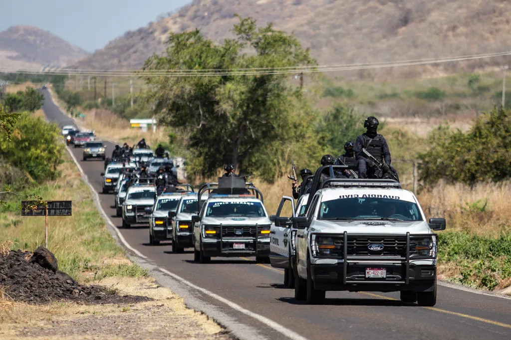 Civil Guard of Michoacan patrolling a highway.
