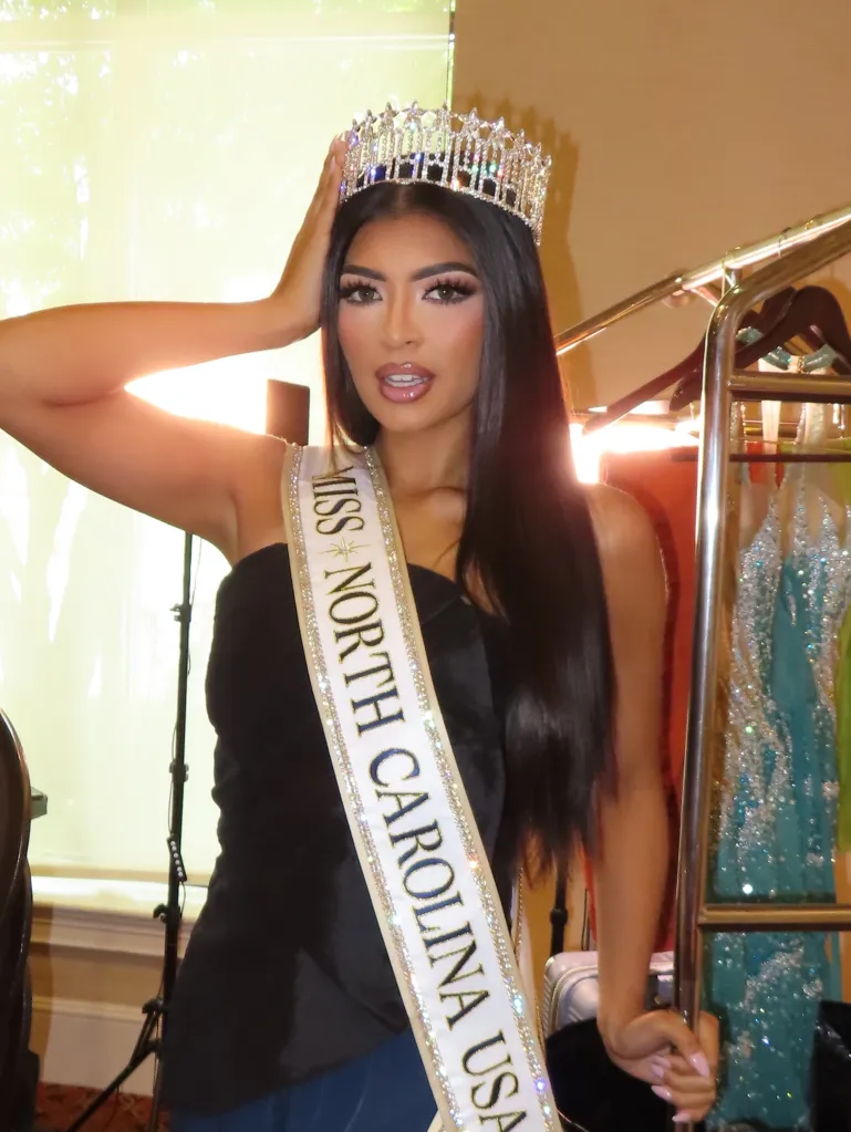 Brittany Boltinhouse wearing a crown and 