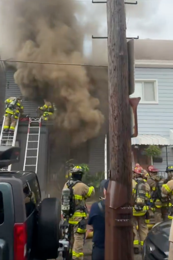 Firefighters battle a blaze as the home of actor Tom Savini burns.