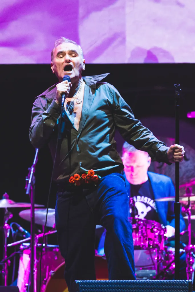 Morrissey performing on stage.