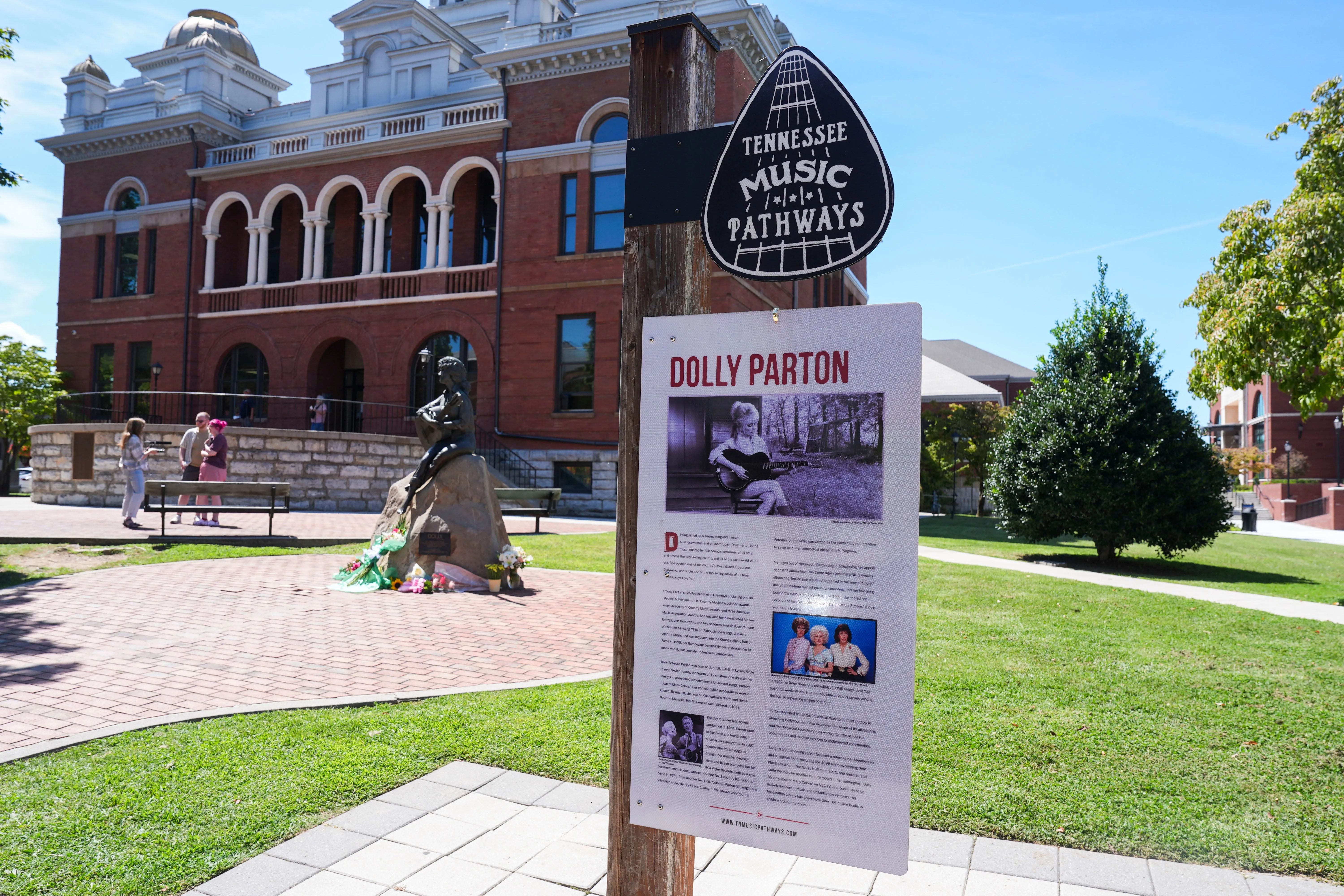 Mourners pay their respects to Dolly Parton after the announcement of her passing at the Dolly Parton Statue
