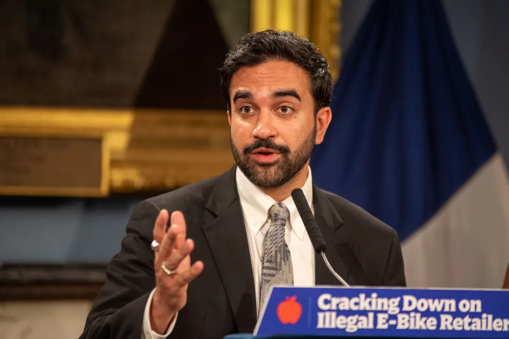 NYC Mayor Zohran Mamdani speaking at a press conference about illegal high-speed e-bike and e-scooter sales.