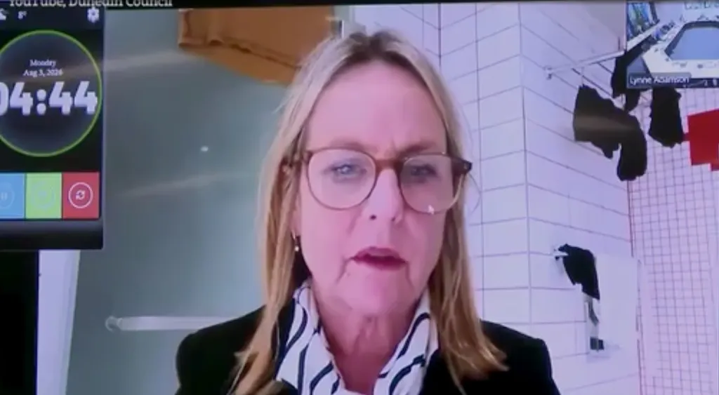 Dunedin City Councillor Jo Galer joining a city council meeting from a bathroom.