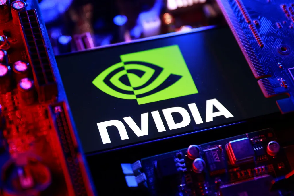 Illustration of the NVIDIA logo and a computer motherboard.
