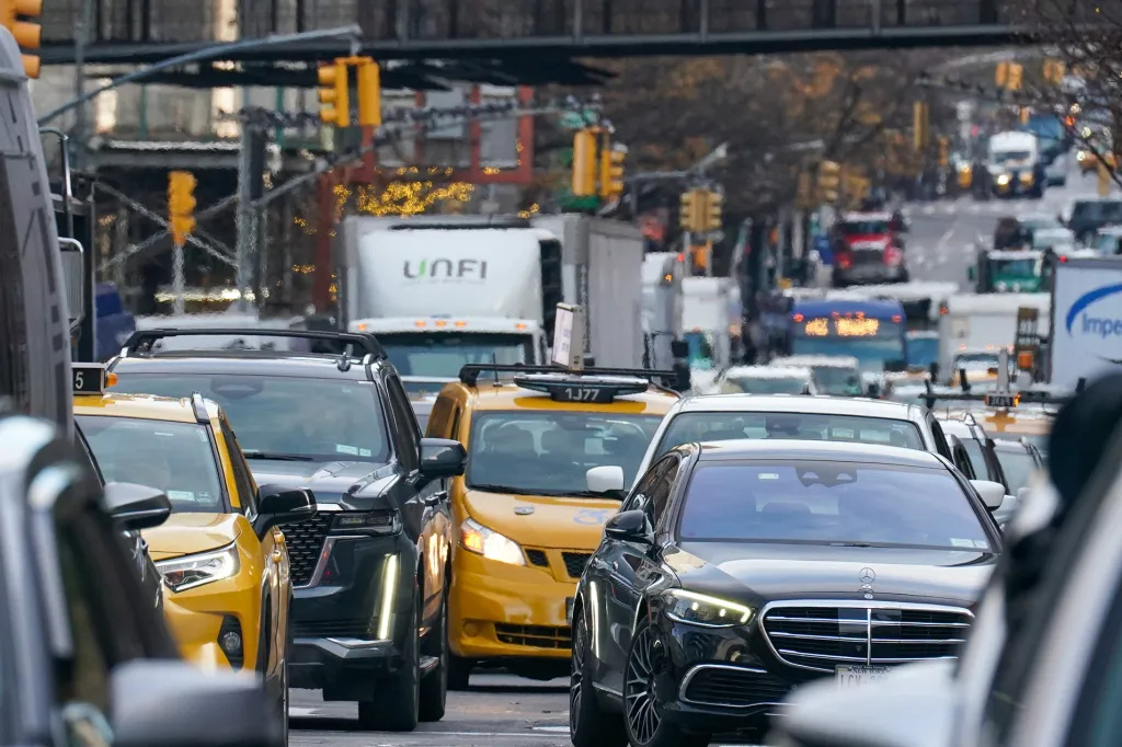Congestion of vehicles on 9th Avenue at W 37th Street in Manhattan.