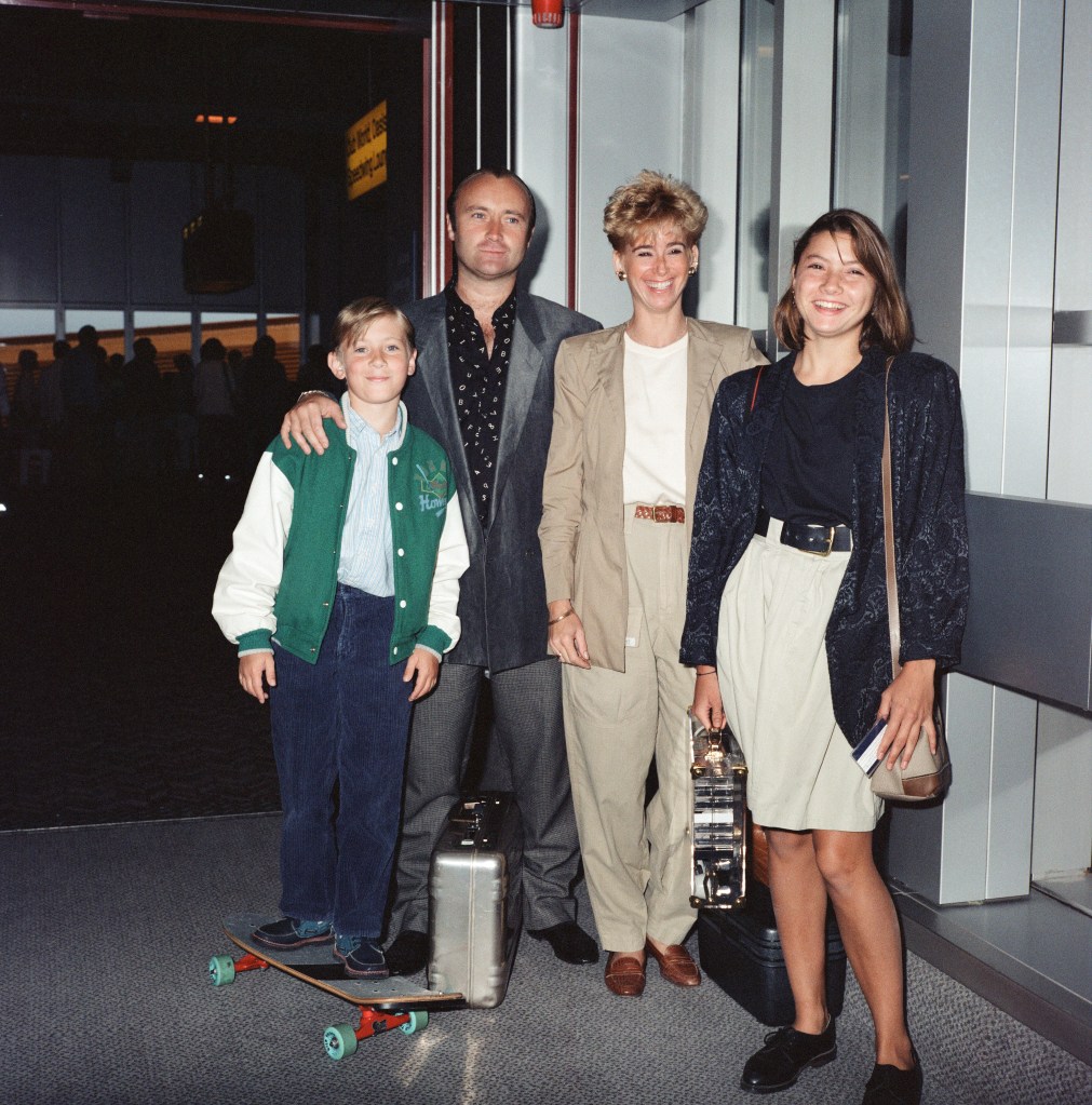 Phil Collins with his wife Jill Tavelman and their children Joely and Simon at Heathrow Airport.