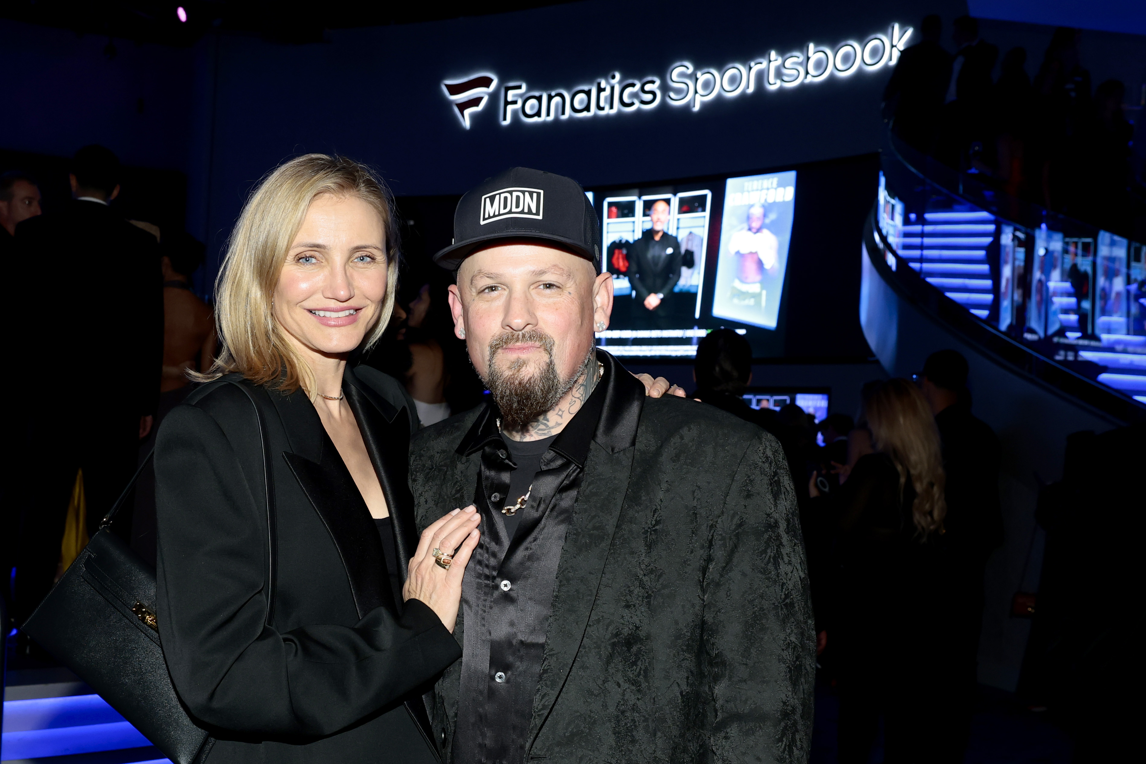 Cameron Diaz and Benji Madden pose for a photo at the Michael Rubin REFORM Alliance Casino Night Event.