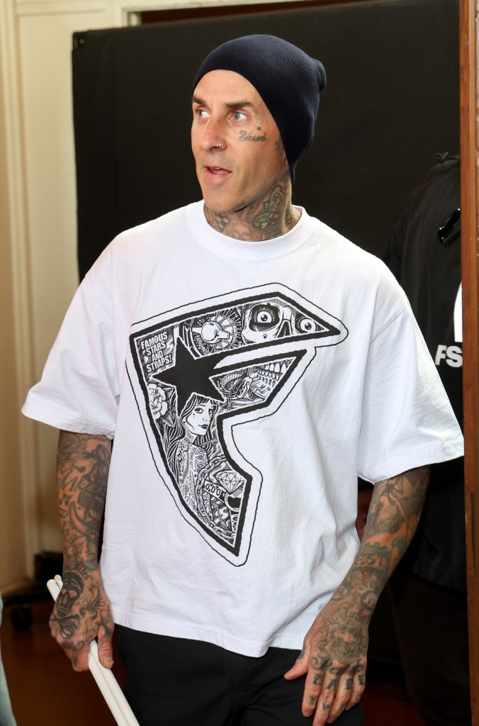 Travis Barker performing with DJ Spider at the Los Angeles World Cup 26 Fan Zone.