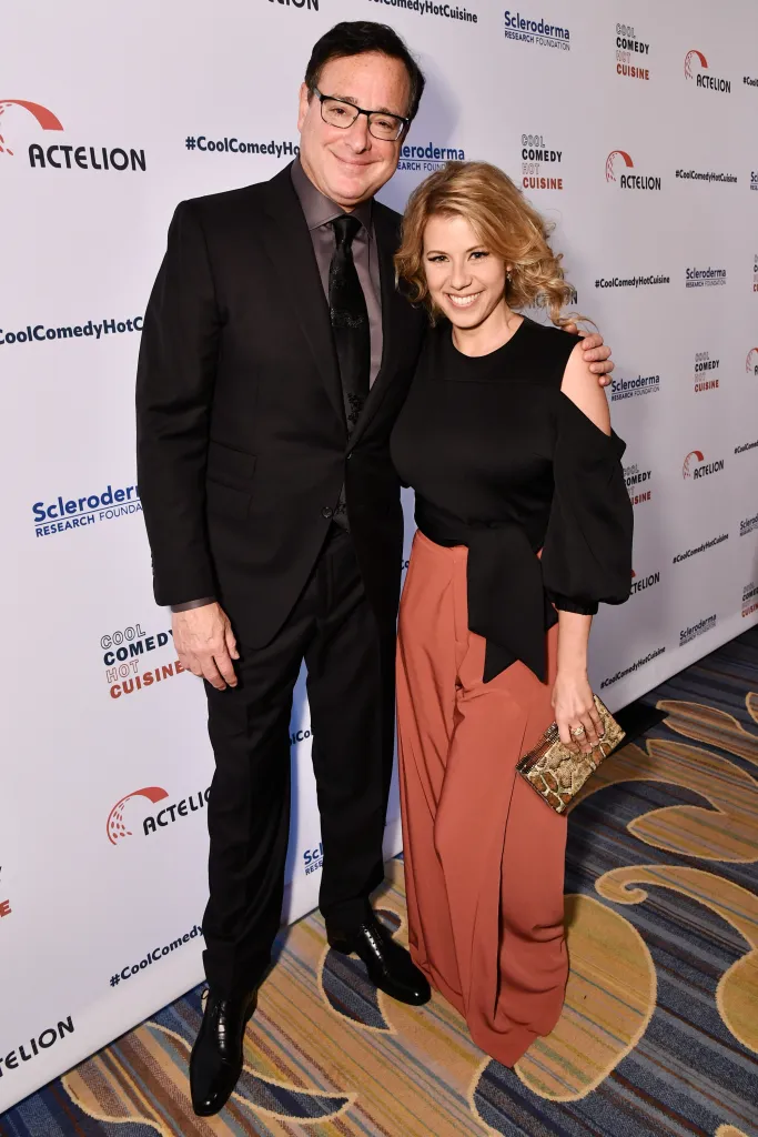 Bob Saget and Jodie Sweetin smiling at the 