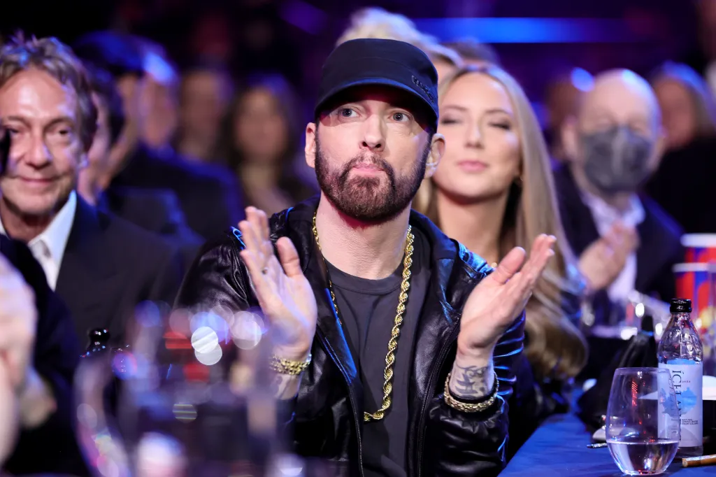 Eminem applauding during the 37th Annual Rock & Roll Hall of Fame Induction Ceremony.