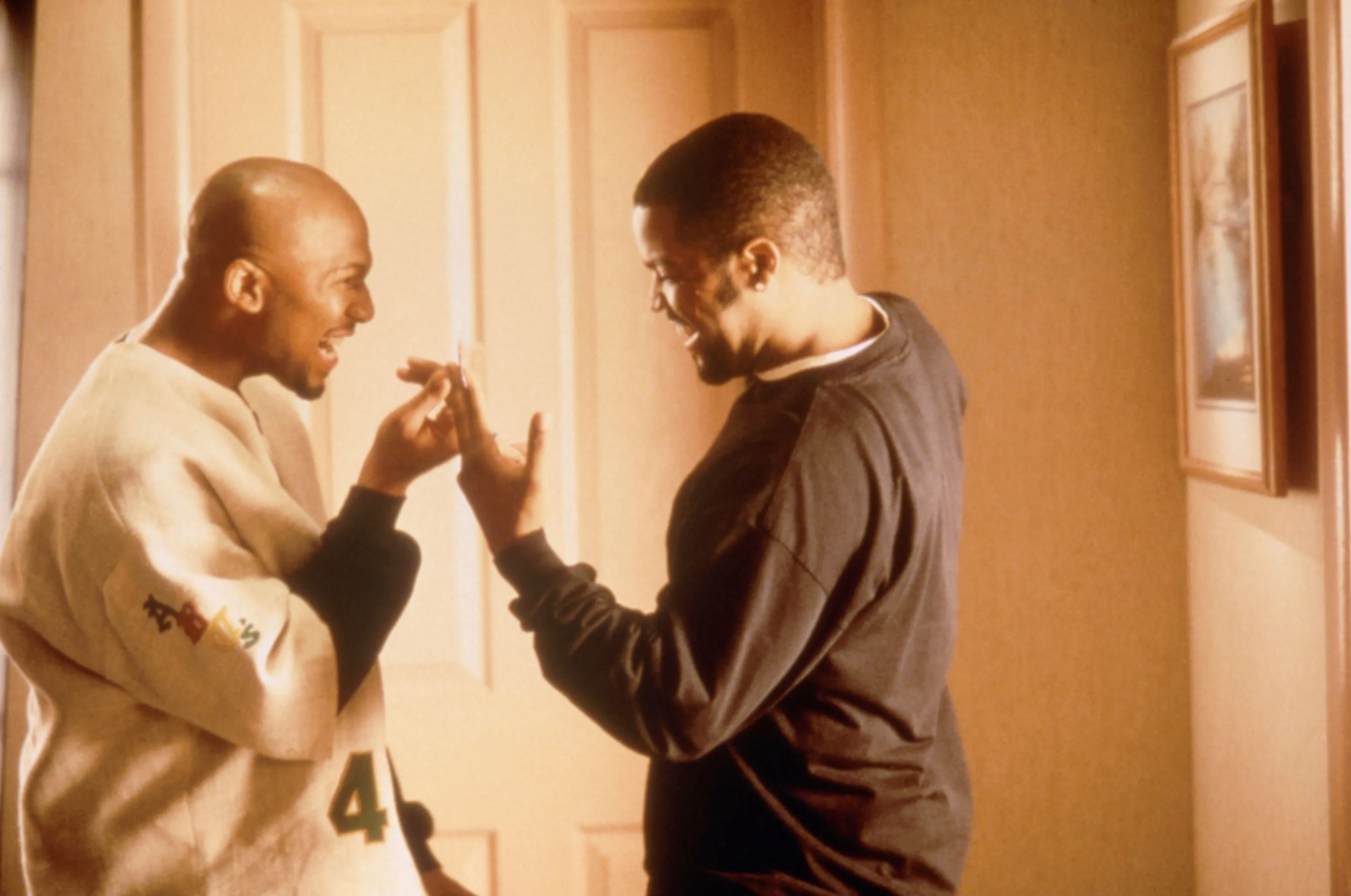 Samuel Monroe Jr. and Ice Cube goofing off in