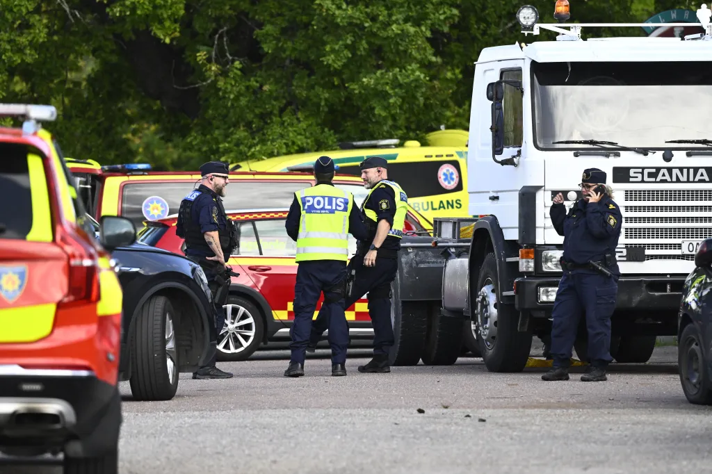 An 18-year-old man with a sword attacked a school Friday in central Sweden, leaving one person dead and at least two others seriously injured, a police chief said.