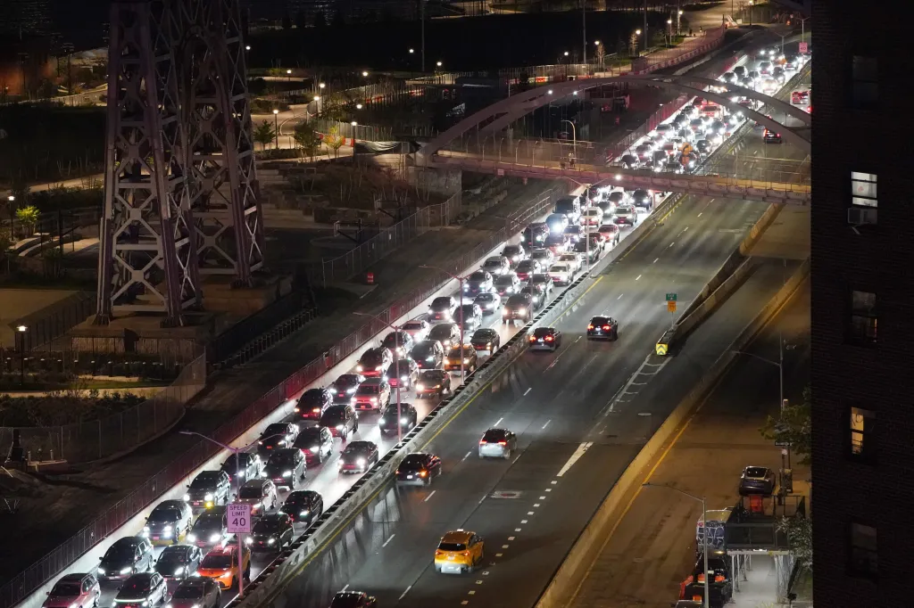 Heavy vehicle traffic on the northbound FDR Drive near Grand Street in New York City.