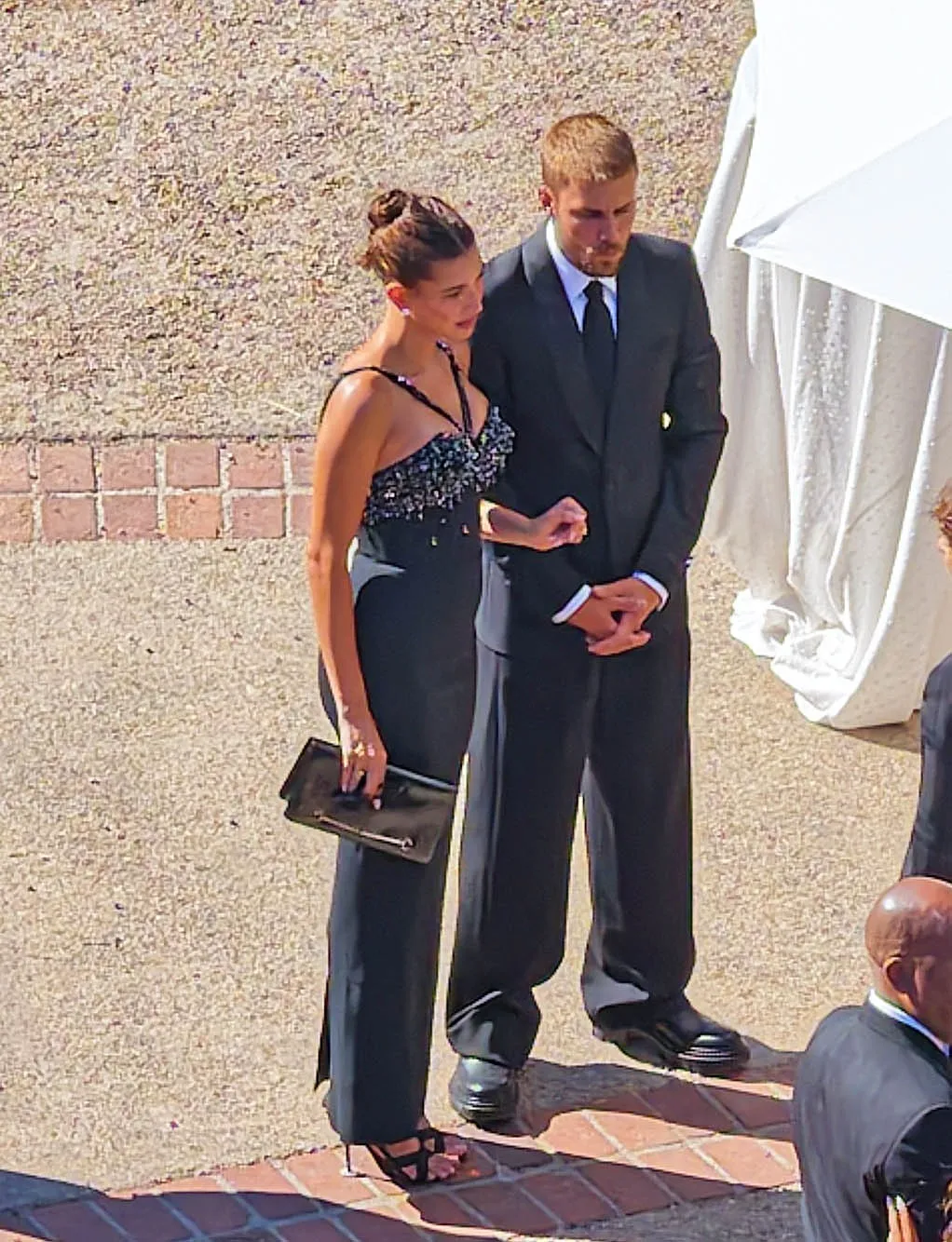 Hailey Bieber and Justin Bieber attending a wedding.