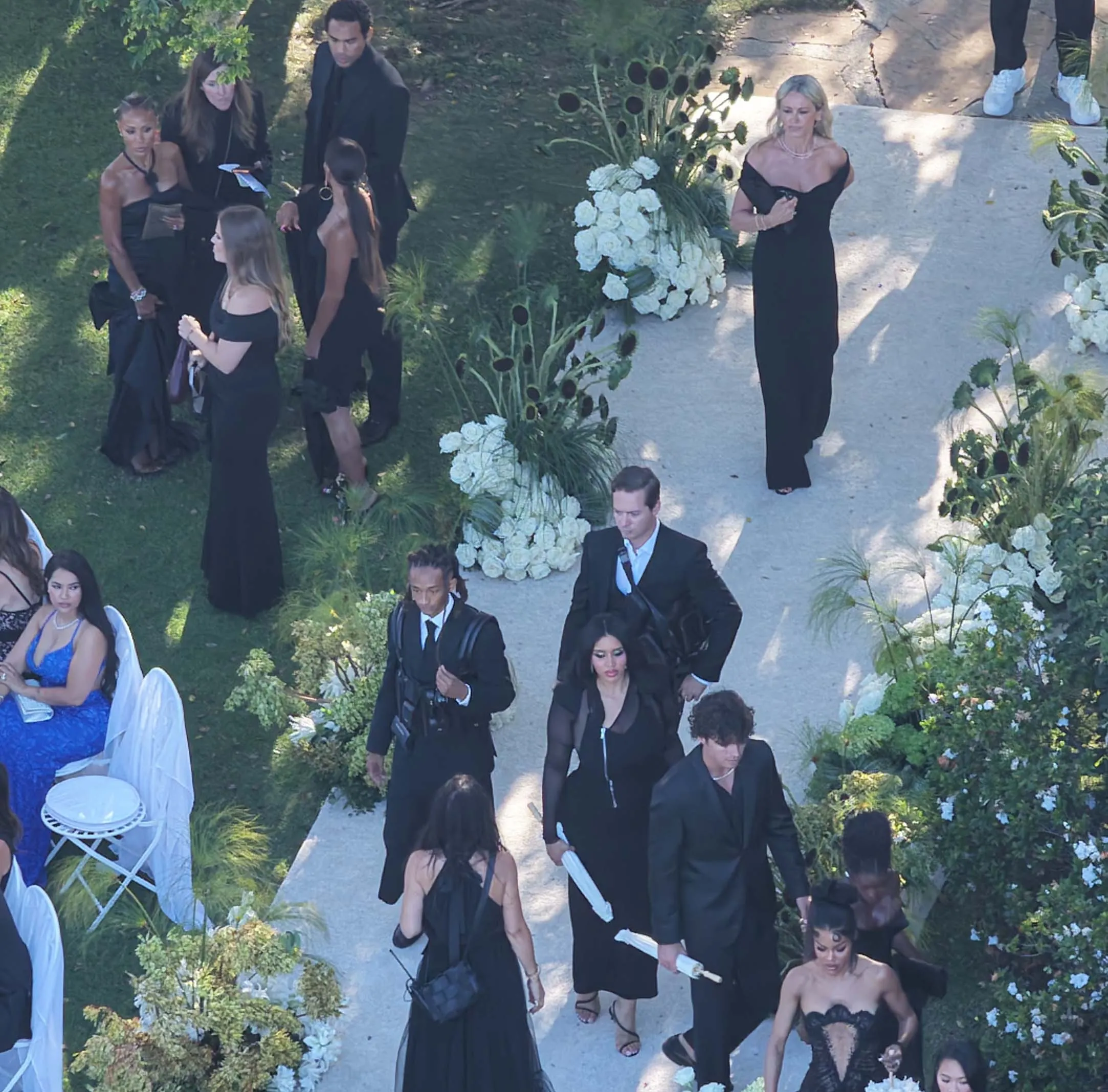 Guests arrive at the wedding of Jordyn Woods and Karl-Anthony Towns, including Jada Pinkett Smith.