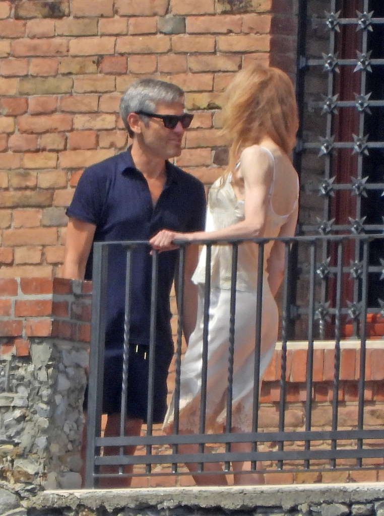 Nicole Kidman on a balcony in Portofino sharing a farewell with a mystery man.